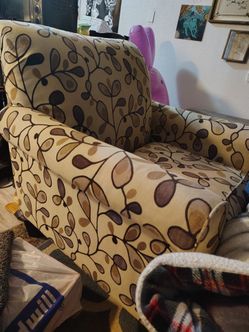 Floral chair and matching otttoman