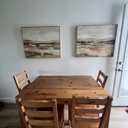 Table Chairs And Wall Art