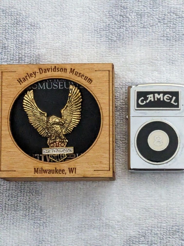 Harley Davidson Museum Wings Along With Eight Ball Zippo Lighter.