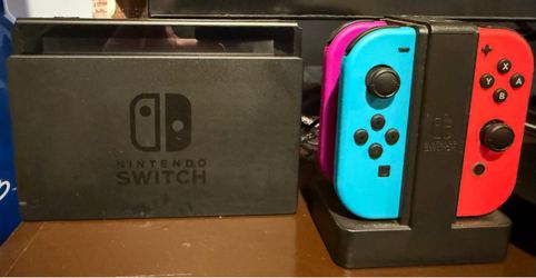 Nintendo switch + Controllers + Games