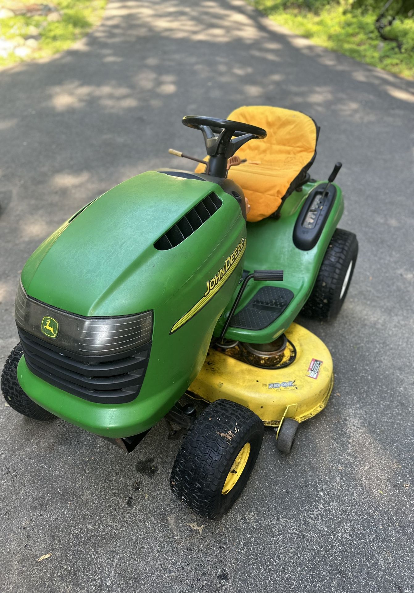 Green John Deere tractor L110 automatic