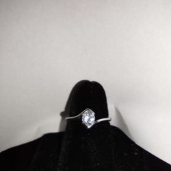 . 25 Carat Rhodium Band Solitaire Engagement/promise ring 