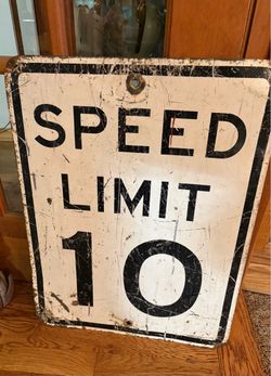 SPEED LIMIT sign