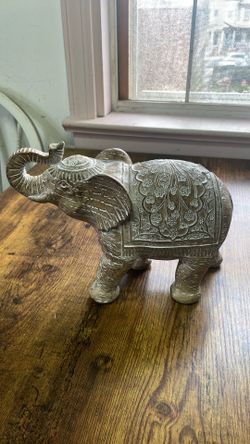 Decorative Elephant Figurine with Carved Floral Detail