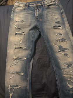 Ripped blue Kusbi jeans