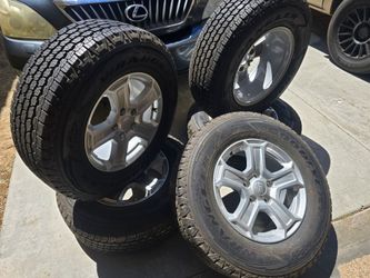 Brand new tires and wheels Jeep 245/75/17