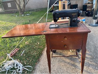 Vintage sewing machine with table