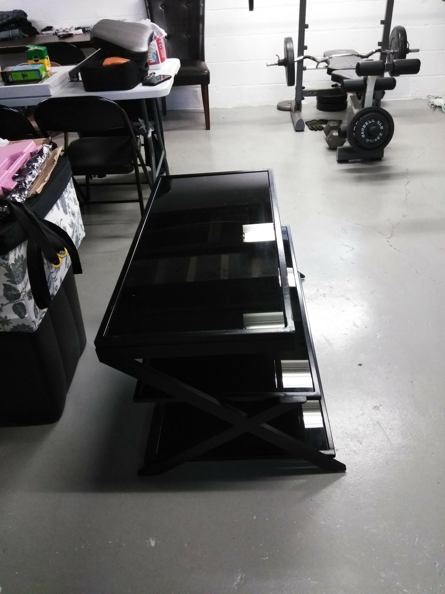 BLK shinning glass tv stand hold up 55 to 60 inches .