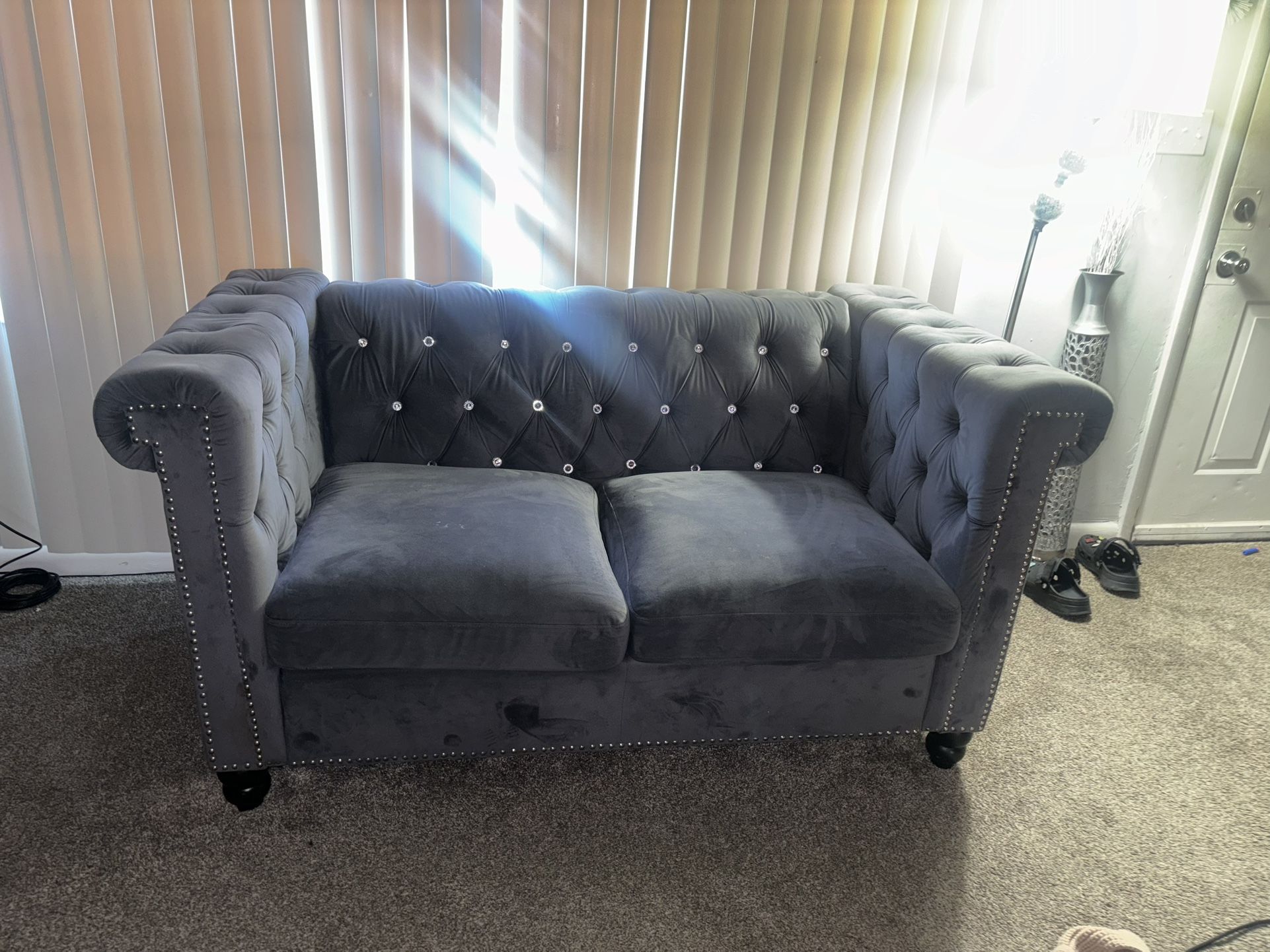 2 grey Sofas .