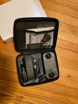 Portable Foldable Camera Drone (with Original Storage Case + Accessories) Selling a high-definition camera foldable drone, ideal for beginners to pra