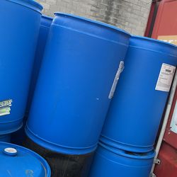 55-gallon blue plastic drums