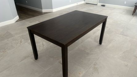 Dark brown dining table