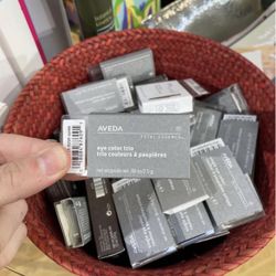 Assorted Aveda Eyeshadows and Lip Products