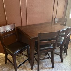 Dining Table And  Chairs