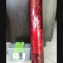 Brand new Gaiam premium yoga mat and the block& Mat Carrier 