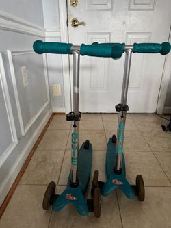 2 Mini Micro Scooters