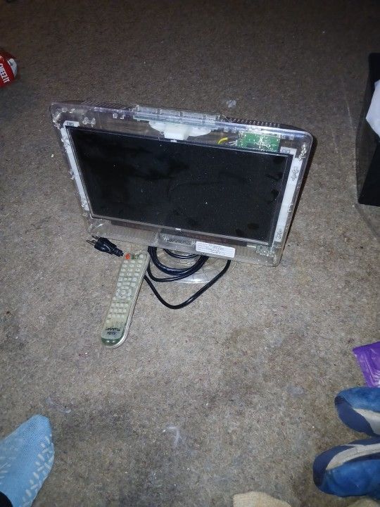 Small Flat See Thru TV W/remote
