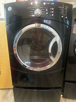 GE dryer with extra storage at the bottom color black and silver