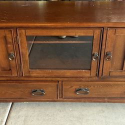Sturdy and stylish solid wood TV stand / console cabinet in excellent working condition.