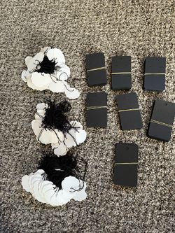 Jewelry string, price tags and earring display cards.