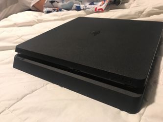 Ps4 slim with games & 2 PlayStation controllers!