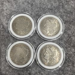 All 4 Morgan silver dollars (1884S.1879S. 1893S.1880S)
