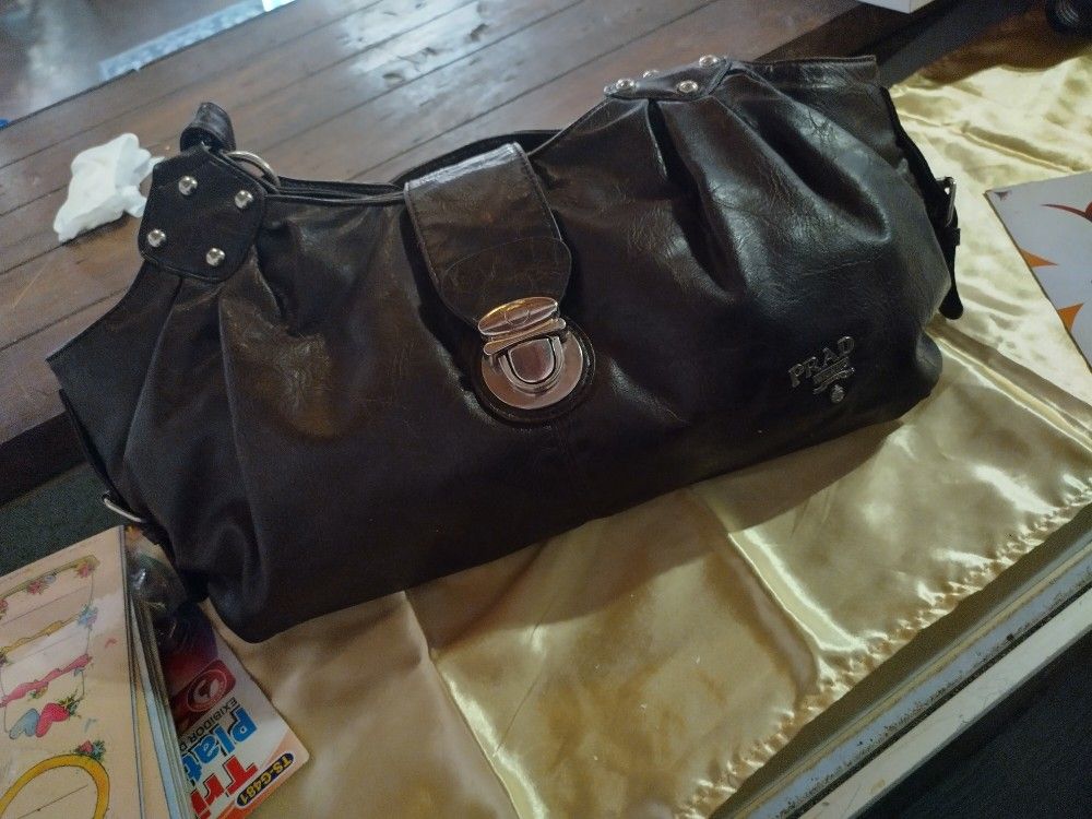 Looks Like It Is An Original Prada. Asking $200 Now Only $150
