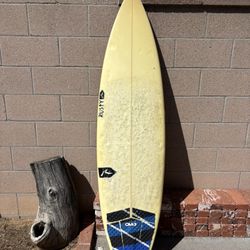 6 ft 2in Rusty surfboard