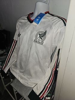 camisa blanca de manga largas