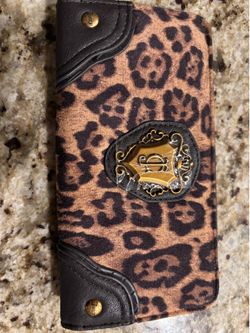 $30 Brand new Juicy Couture wallet and gently used Francesco Biasia black pebbled leather wallet.