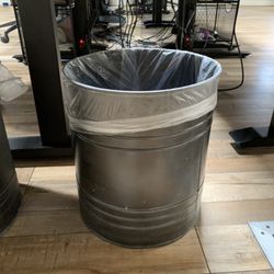 Sturdy Metal Trash Can with Industrial Appeal