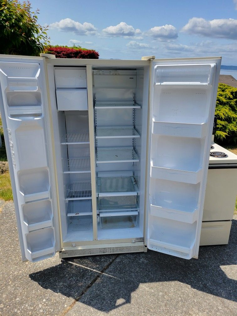 Side By Side Refrigerator And A Range