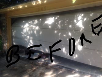 GARAGE DOOR . BROKEN SPRING