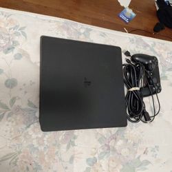 Ps4 with Duelshock Controller and charger