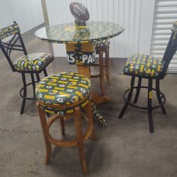 OR BEST OFFER!

AWESOME! GREEN BAY PACKERS PEDESTAL TABLE + 4 SWIVEL STOOLS & CUSTOM FOOTBALL

