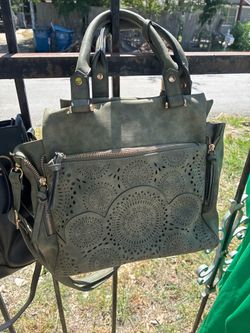 Green Handbag with cutout design