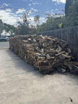 A Wheelbarrow Of Firewood For $20.
