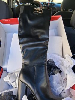 Brand New in the box never used knee high GUESS black boots special edition