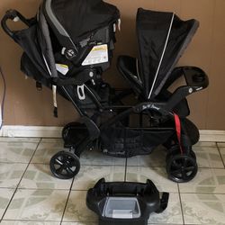 LIKE NEW BABY TREND DOUBLE STROLLER WITH CAR SEAT!!!!!