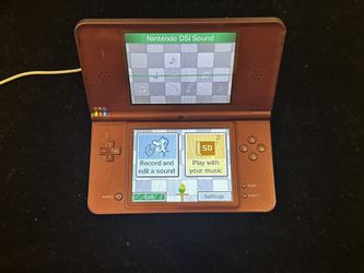 Nintendo DSi XL Handheld Game Console (Burgundy) 