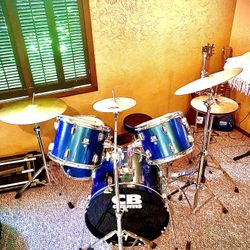 CB Drum Set, 5 Cymbals, Stands Pedals And Throne
