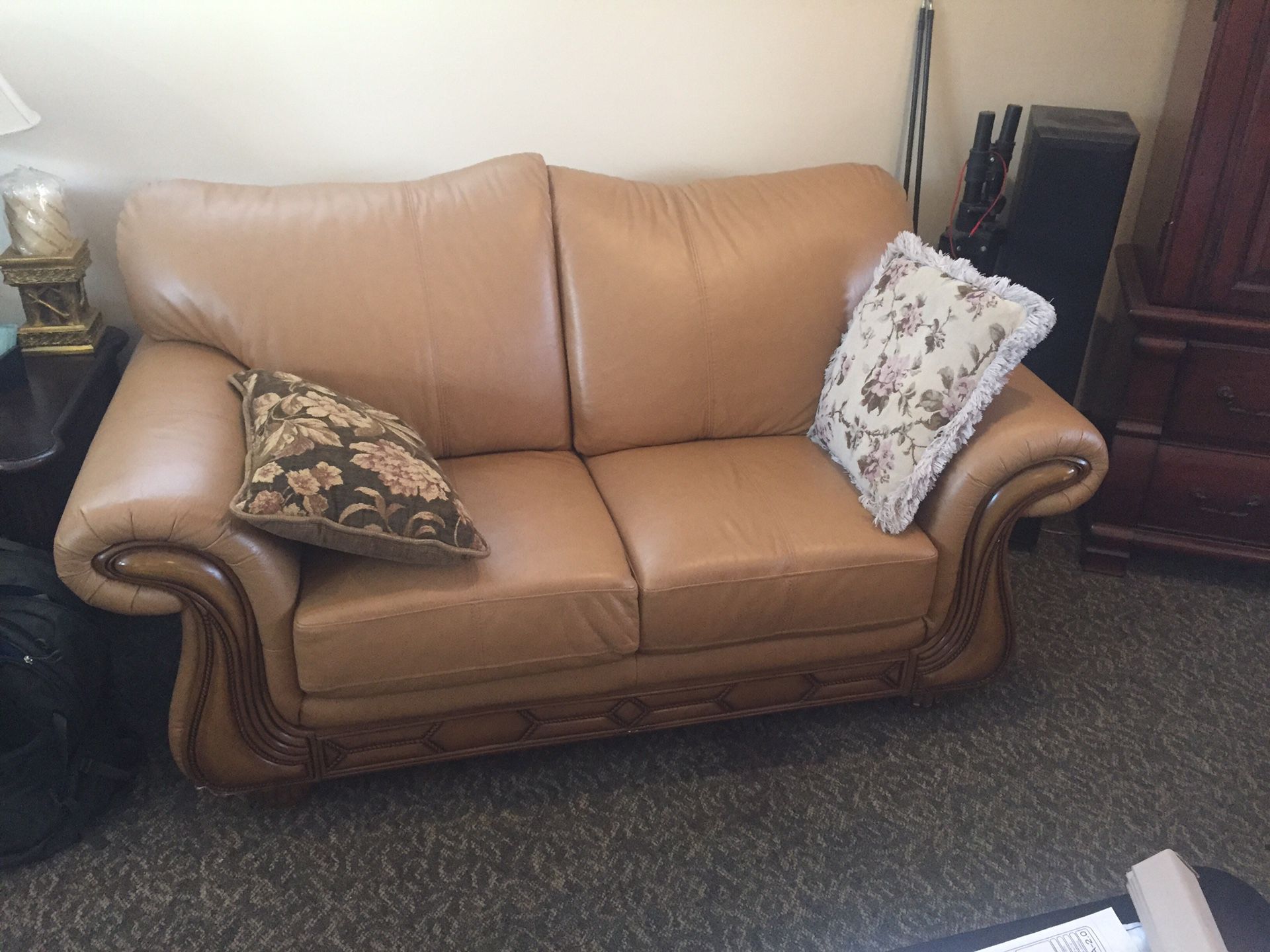 Love seat and couch! Leather with wood framing. Great condition. Never used (in fact there is a little dust on them).