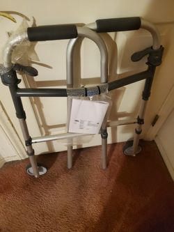 Brand New Adjustable Walker Folds Up When Not Used Holds Up To 300 Lbs Made By INVACARE 