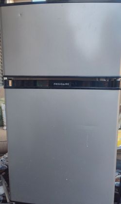 Frigidaire mini fridge practically new