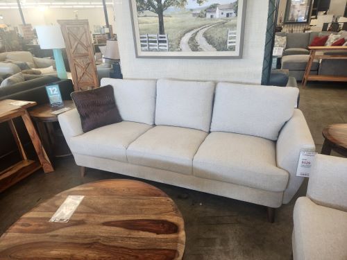 Mid Century Modern light cream Sofa with Tapered leg