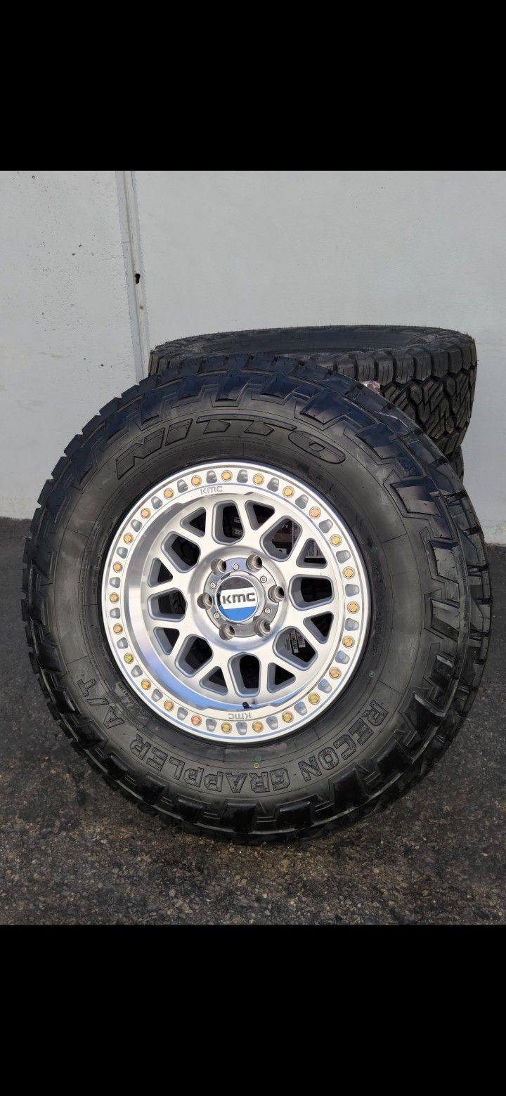 17" KMC rims w- 33" Nitto Recon Grappler Tires