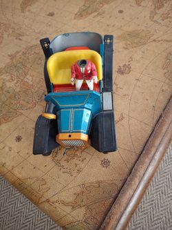 Vintage tin lithograph wind up toy car