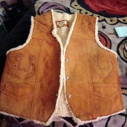 Two cowboy vests