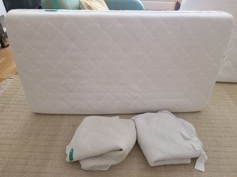 Newton original crib mattress with 2 mattress covers
