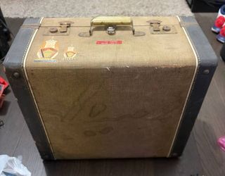 vintage hard accordion case, typically dating from the mid-20th century
